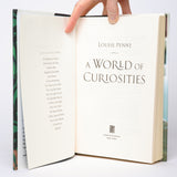 A World of Curiosities (Chief Inspector Gamache #18) - Penny, Louise